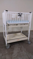 HARD INFANT CRIB