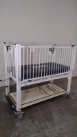 HARD INFANT CRIB