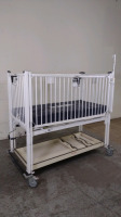 HARD INFANT CRIB