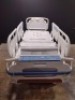 STRYKER SECURE 3005 S3 HOSPITAL BED WITH FOOTBOARD (CHAPERONE WITH ZONE CONTROL, BED EXIT, SCALE) (IBED AWARENESS)