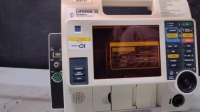 MEDTRONIC/PHYSIO-CONTROL LIFEPAK 12 BIPHASIC DEFIB WITH PACING, 3 LEAD ECG, SPO2, NIBP, ANALYZE, PADDLES, BATTERIES, AC ADAPTER