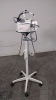 WELCH ALLYN CL 300 LIGHT SOURCE WITH HEAD LAMP ON ROLLING STAND