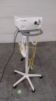 WELCH ALLYN CL 300 LIGHT SOURCE WITH HEAD LAMP ON ROLLING STAND