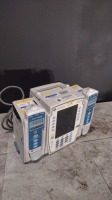 CAREFUSION ALARIS PC 8015 INFUSION PUMP WITH TWO ALARIS 8100 PUMP MODULE