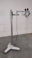 DFV SURGICAL MICROSCOPE WITH SINGLE BINOCULARS (12,5X), BOTTOM LENS (ZEISS F=200 =), ROLLING STAND