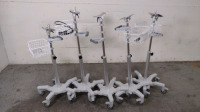 LOT OF (4) ROLL STANDS