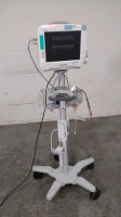 PHILIPS INTELLIVUE MP50 PATIENT MONITOR WITH MULTI-PARAMETER MODULE (M3001A) AND CABLES (ECG/RESP, SPO2) ON ROLLING STAND