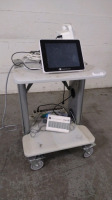 EDWARD LIFESCIENCES EV1000M MONITORING SYSTEM TO INCLUDE: EV1000M MONITOR, EV1000 DATABOX, EVPMP PUMP UNIT ON ROLLING CART