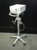 WELCH ALLYN CL 30 LIGHT SOURCE WITH HEAD LAMP ON ROLLING STAND