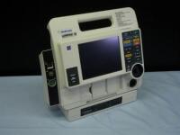 MEDTRONIC/PHYSIO-CONTROL LIFEPAK 12 BIPHASIC DEFIB WITH 3 LEAD ECG, PACER, ANALYZE, SPO2, ECG, NIBP,2 BATTERIES, AC POWER ADAPTER