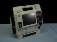 MEDTRONIC/PHYSIO-CONTROL LIFEPAK 12 BIPHASIC DEFIB WITH 3 LEAD ECG, ANALYZE, ECG, 2 BATTERIES, AC POWER ADAPTER