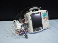 PHILIPS HEARTSTART MRX DEFIB WITH ECG CABLE, M3725A TEST LOAD, BATTERY AND AC POWER MODULE