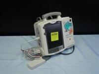 PHILIPS HEARTSTART MRX DEFIB WITH ECG CABLE, M3725A TEST LOAD, BATTERY AND AC POWER MODULE