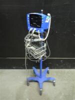 GE DINAMAP V100 CARESCAPE VITAL SIGNS MONITOR WITH CABLES (SPO2 AND BP) ON ROLLING STAND