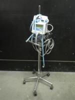 JOHNSON & JOHNSON CRITIKON DINAMAP COMPACT T PATIENT MONITOR WITH BP CABLES ON ROLLING STAND