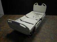 HILL-ROM VERSA CARE HOSPITAL BED WITH HEAD AND FOOTBOARDS