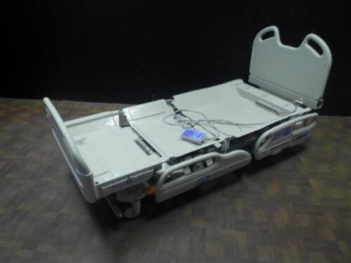 HILL-ROM VERSA CARE HOSPITAL BED WITH HEAD AND FOOTBOARDS