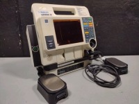 MEDTRONIC/PHYSIO-CONTROL LIFEPAK 12 BIPHASIC DEFIB WITH PACING, 3 LEAD ECG, ANALYZE, PADDLES, AC ADAPTER