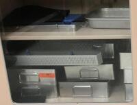 SHELF OF TRAY INSERTS