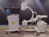 GE STENOSCOP C-ARM SYSTEM WITH 9 INCH II TO INCLUDE DUAL MONITOR WORKSTATION WITH HAND CONTROL & FOOTSWITCH