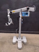 CARL ZEISS OPMI 111 SURGICAL MICROSCOPE TO INCLUDE DUAL MOUNT BINOCULARS WITH EYEPIECES BOTH (10X/22B) BOTTOM LENSE (F 250) ON 21 STAND