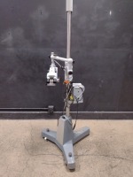 CARL ZEISS OPMI 1 SFC SURGICAL MICROSCOPE WITH BINOCULARS (12,5X EYEPIECES,BOTTOM LENCE F250) ON ROLLING STAND