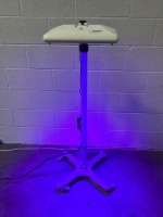 GE LULLABY PHOTOTHERAPY UNIT ON ROLLING STAND