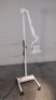 CENTRY EXAM LIGHT ON ROLLING STAND