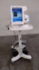 PHILIPS RESPIRONICS V60 VENTILATOR ON ROLLING STAND (SN 100278589)