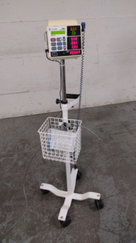 ALARIS/IVAC 4415 VITAL SIGNS MONITOR ON ROLLING STAND