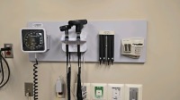 WELCH ALLYN INTEGRATED WALL BOARD SYSTEM TO INCLUDE: 777 TRANSFORMER WITH REF 23810 MACRO VIEW OTOSCOPE, REF 901022 PANOPTIC OPHTHALMOSCOPE, SPHYGMOMANOMETER, DIGITAL THERMOMETER DOCK STATION, SPECULA TIP DISPENSER