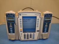CAREFUSION ALARIS 8015 PC UNIT WITH QTY (2) CARDINAL HEALTH ALARIS 8100 SERIES INFUSION PUMP