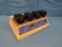 STRYKER 7110-120-000 BATTERY CHARGER WITH (2) SYSTEM 7 AND (2) SYSTEM 8 BATTERIES