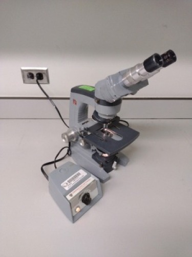 AMERICAN OPTICAL MICROSCOPE WITH 1051 OPTICAL TRANSFORMER