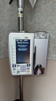 IRADIMED CORP. MRIDIUM MRI INFUSION PUMP ON MRIDIUM MRI IV POLE STAND