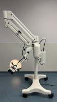 GLOBAL SURGICAL MICROSCOPE WITH M793HD HALOGENTWO SYSTEM LIGHT SOURCE, (M1010, M1010) EYEPIECE, M 1028G-250 OBJECTIVE LENS ON ROLLING FLOOR STAND