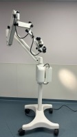 GLOBAL SURGICAL MICROSCOPE WITH M793HD HALOGENTWO SYSTEM LIGHT SOURCE, (M1010, M1010) EYEPIECE, M 1028G-250 OBJECTIVE LENS ON ROLLING FLOOR STAND