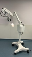 GLOBAL SURGICAL MICROSCOPE WITH M793HD HALOGENTWO SYSTEM LIGHT SOURCE, (M1010, M1010) EYEPIECE, M 1028G-250 OBJECTIVE LENS ON ROLLING FLOOR STAND