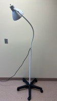 FLEXIBLE ARM EXAM LIGHT ON ROLLING STAND