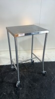 WILSON MOBILE STAINLESS STEEL MEDICAL TABLE