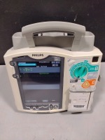 PHILIPS HEARTSTART MRX DEFIB WITH PACING, 3 LEAD ECG, CO2, SPO2, NIBP, ANALYZE