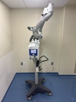 ZEISS OPMI SENSERA SURGICAL MICROSCOPE ON S7 STAND WITH MOUNT BINOCULARS WITH EYEPIECES BOTH (10X) WITH BOTTOM LENSE ON GMBH STAND LOCATED AT 2100 DORCHESTER AVE. DORCHESTER, MA 02124