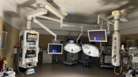 SKYTRON AURORA II SURGICAL LIGHT, CEILING MOUNTED WITH MONITOR ARM AND BRIDGE POWER CORPORATION 24" MONITOR (QTY. 2) WITH WALL CONTROLLER LOCATED AT 2100 DORCHESTER AVE. DORCHESTER MA 02124