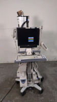 NIHON KOHDEN EEG-1200A EEG SYSTEM TO INCLUDE: EEG-1200A UNIT, LS2-120, NEUROFAX, LS-703A, ROLLING CART