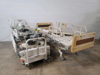 HILL-ROM LOT OF TWO VERSA CARE AND ONE ADVANCE (3 TOTAL) HOSPITAL BEDS