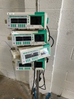 LOT OF BRAUN OUTLOOK 400ES INFUSION PUMPS ON ROLLING STAND