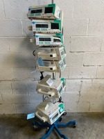 LOT OF BRAUN OUTLOOK 400ES INFUSION PUMPS ON ROLLING STAND