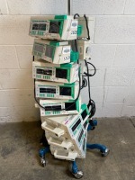 LOT OF BRAUN OUTLOOK 400ES INFUSION PUMPS ON ROLLING STAND