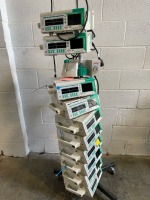 LOT OF BRAUN OUTLOOK 400ES INFUSION PUMPS ON ROLLING STAND