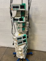 LOT OF BRAUN OUTLOOK 400ES INFUSION PUMPS ON ROLLING STAND